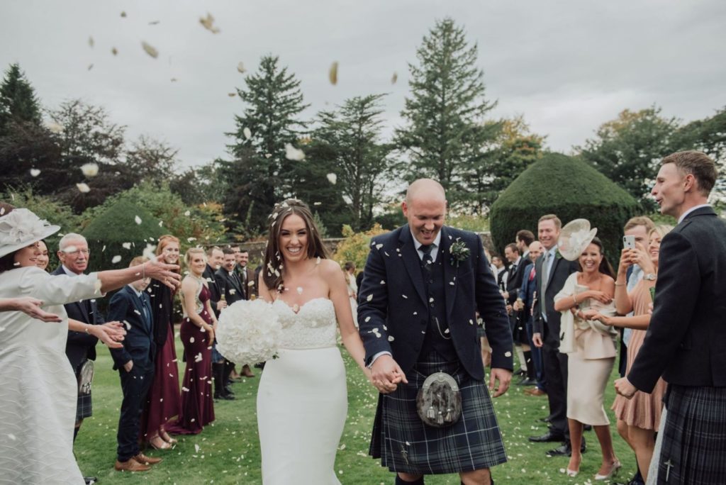 Outdoor wedding ceremony at Elsick House Exclusive Use Venue Scotland